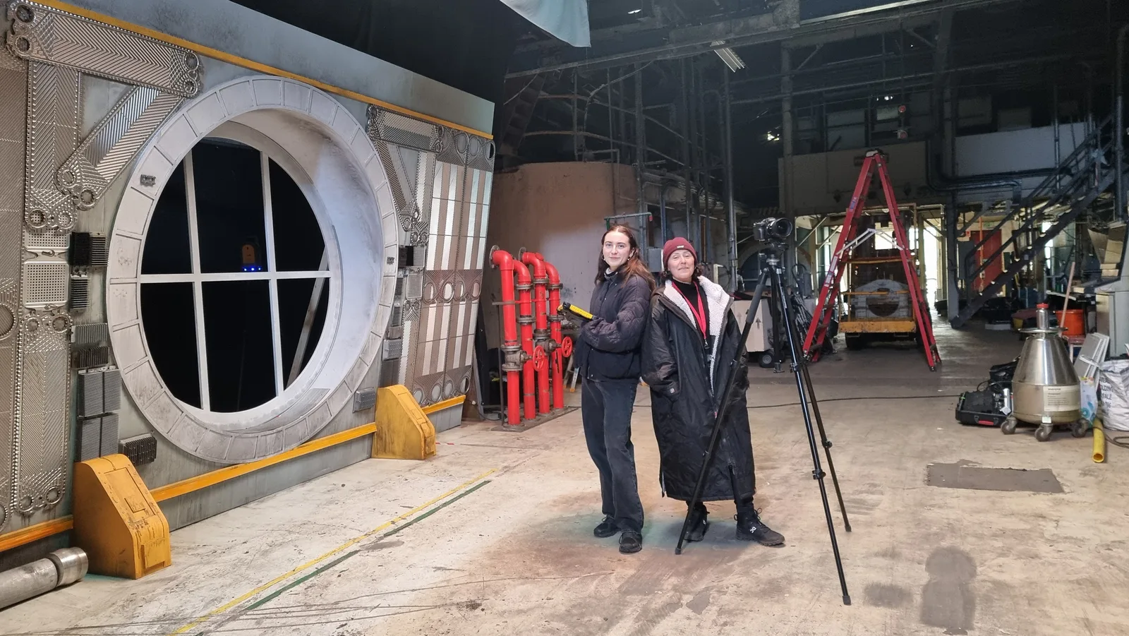 Two of the Kittiwake Digital crew with a laser scanner on the studio set
