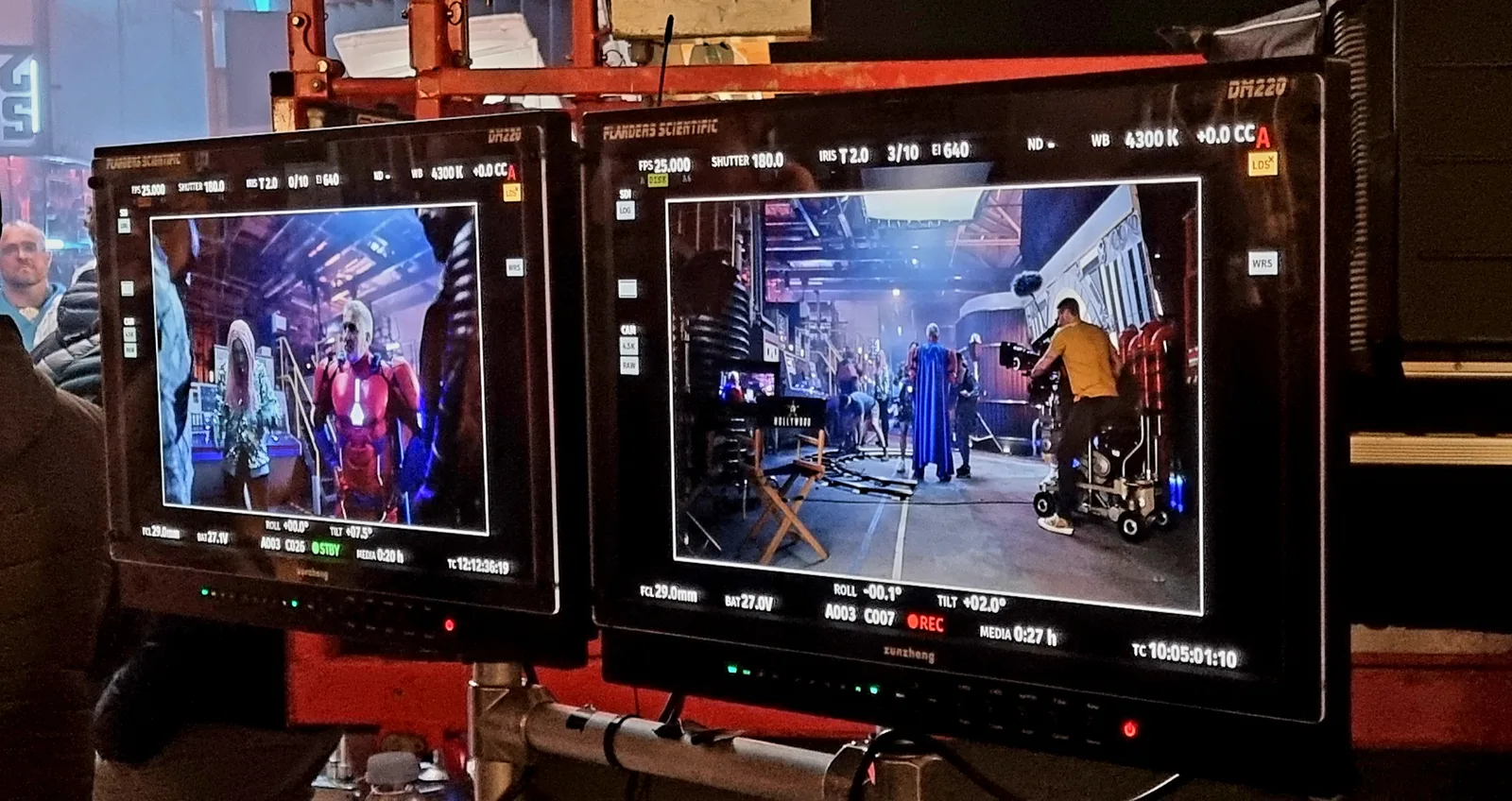 Monitors on set showing the shot being filmed for the campaign
