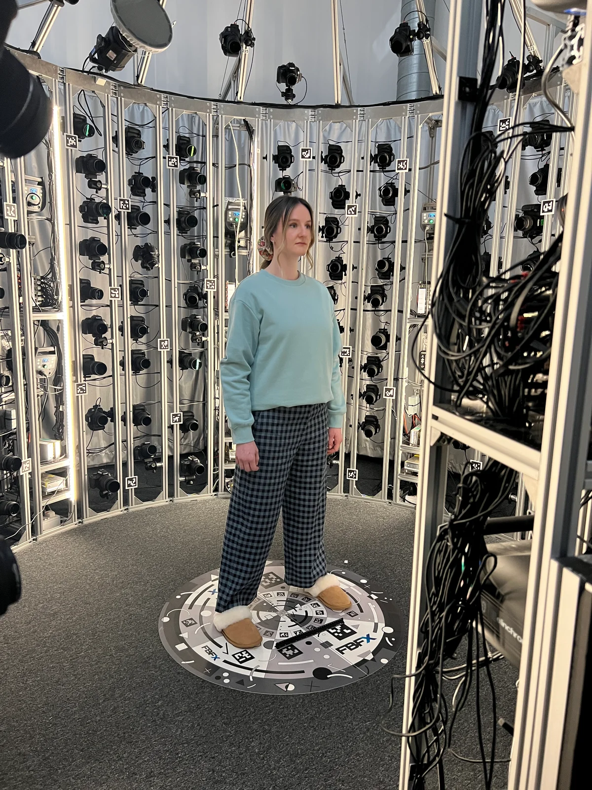 Actor standing inside the FBFX multi-camera body scanning rig