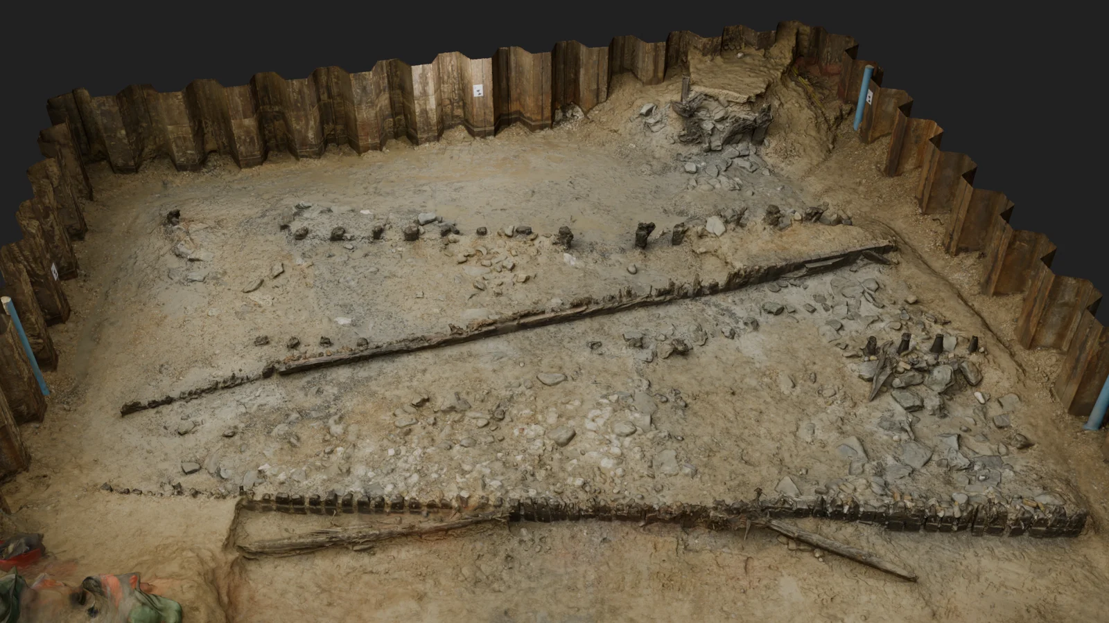 Model of the excavated harbour wall running the length of the trench
