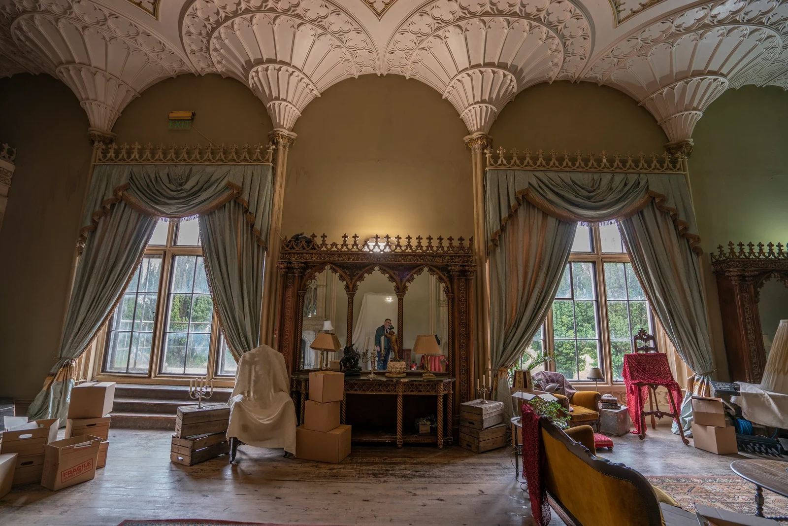 The castle drawing room with its vaulted ceiling, dressed for filming