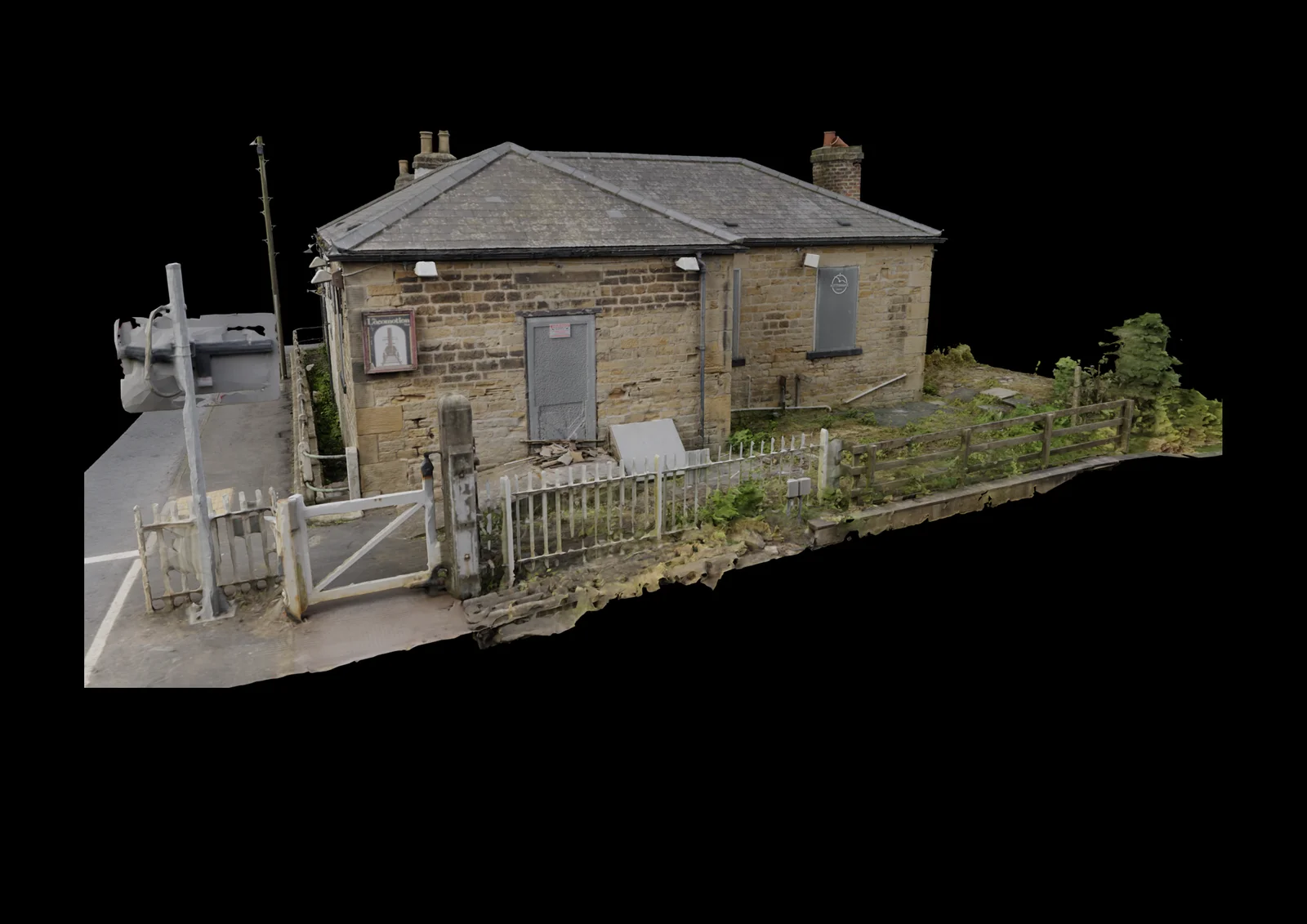Model of the station seen past the level crossing gate