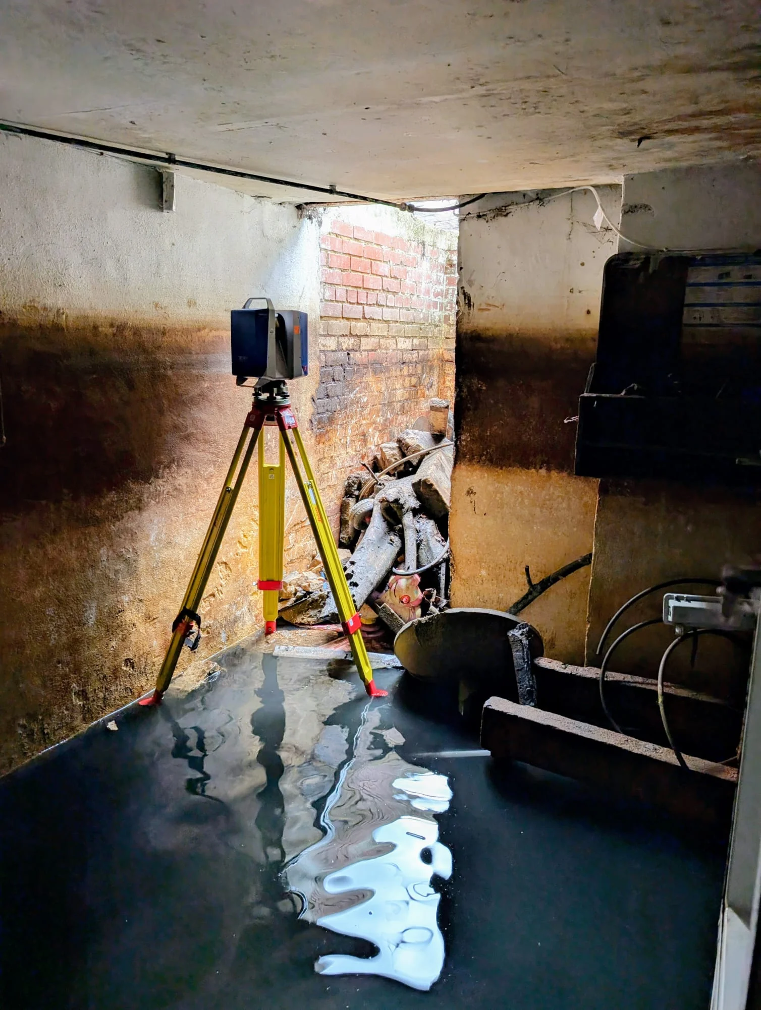 Laser scanner set up in the station's flooded cellar