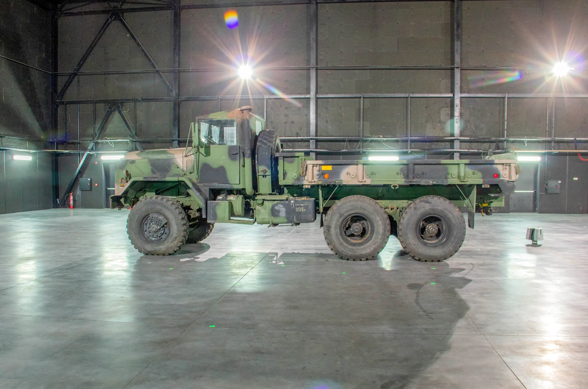 M939 army truck inside the lit hangar studio set up for 3D capture