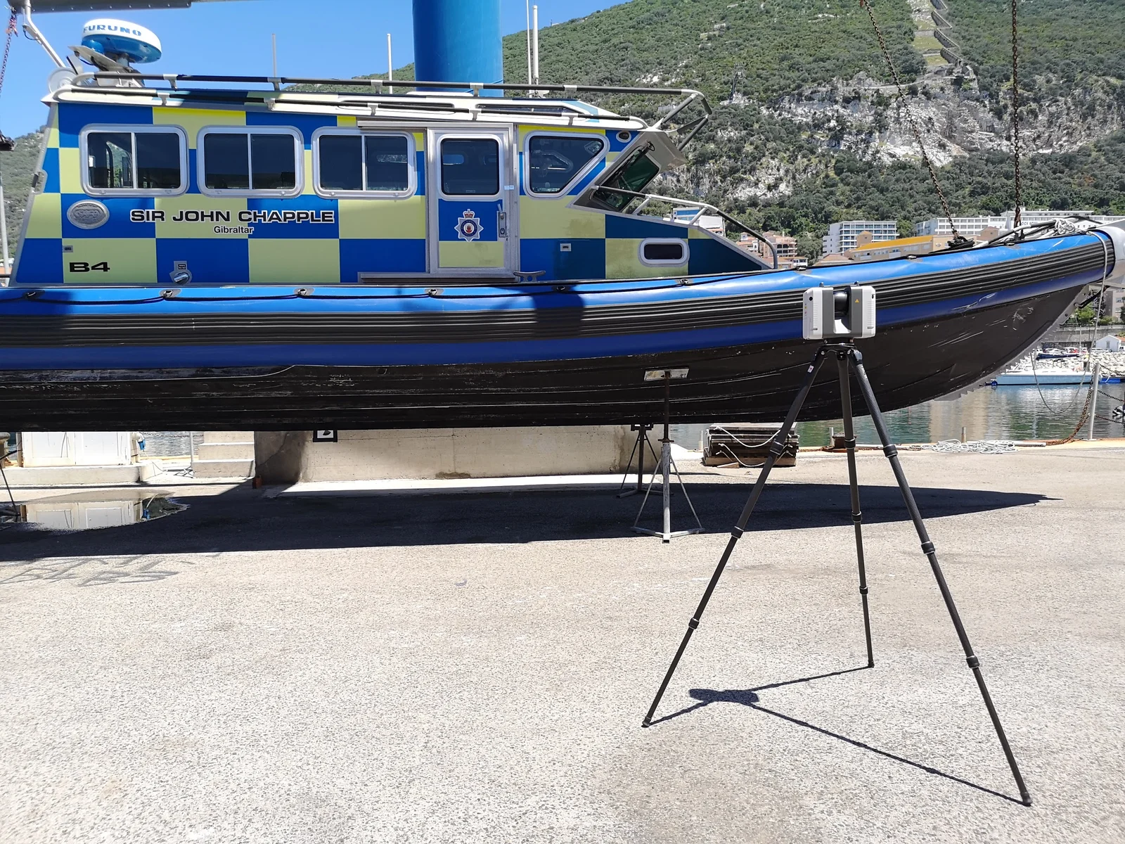 The police launch out of the water on its trailer, ready to be scanned