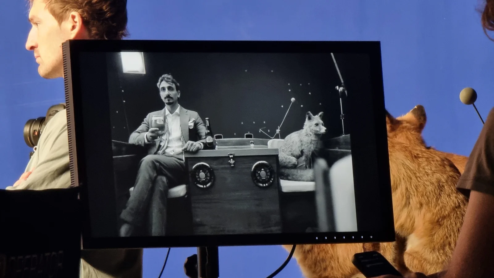 The lead actor framed on the monitor during the shoot