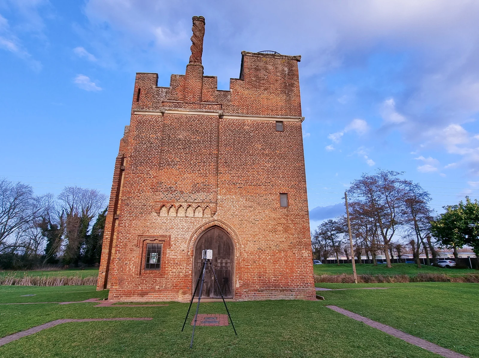 The gatehouse from the approach path on a clear winter day