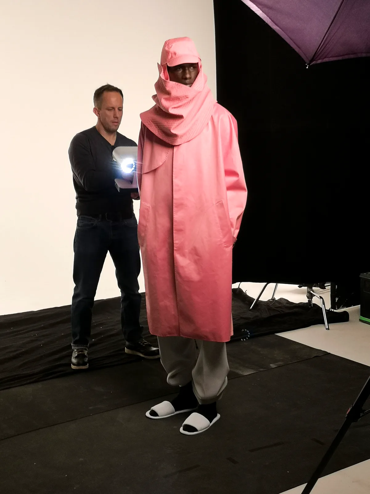 Handheld scanning of a model in a pink hooded coat