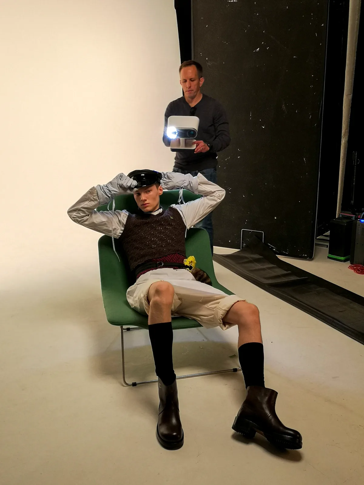 Seated model being scanned with a handheld scanner
