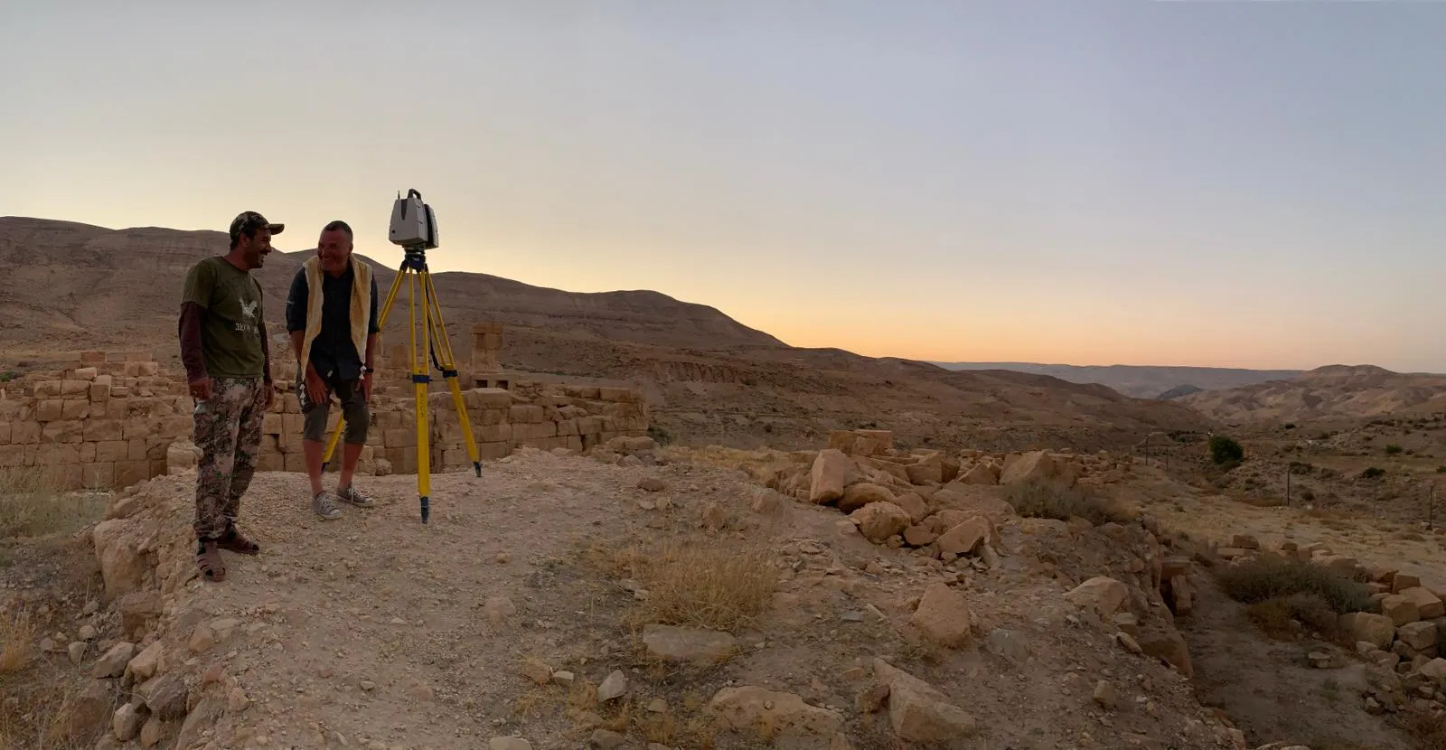 Kittiwake Digital team with LiDAR scanner at archaeological site at dusk